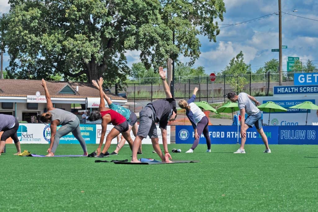 Outdoor yoga event with Hartford Sweat for Health Day with Hartford Athletic